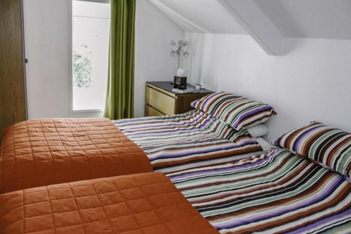 Postel nebo postele na pokoji v ubytování Culver House Hotel