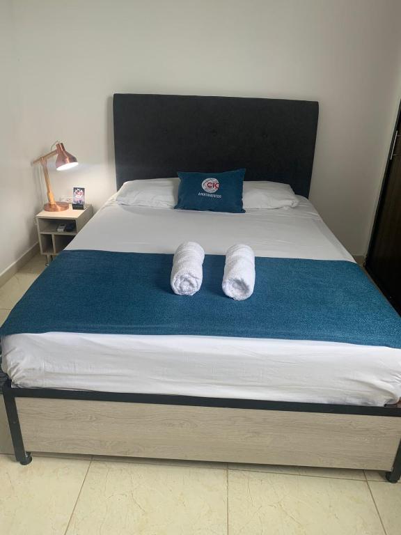 Postel nebo postele na pokoji v ubytování CIC Apartamento amoblado Mirador del Sinú