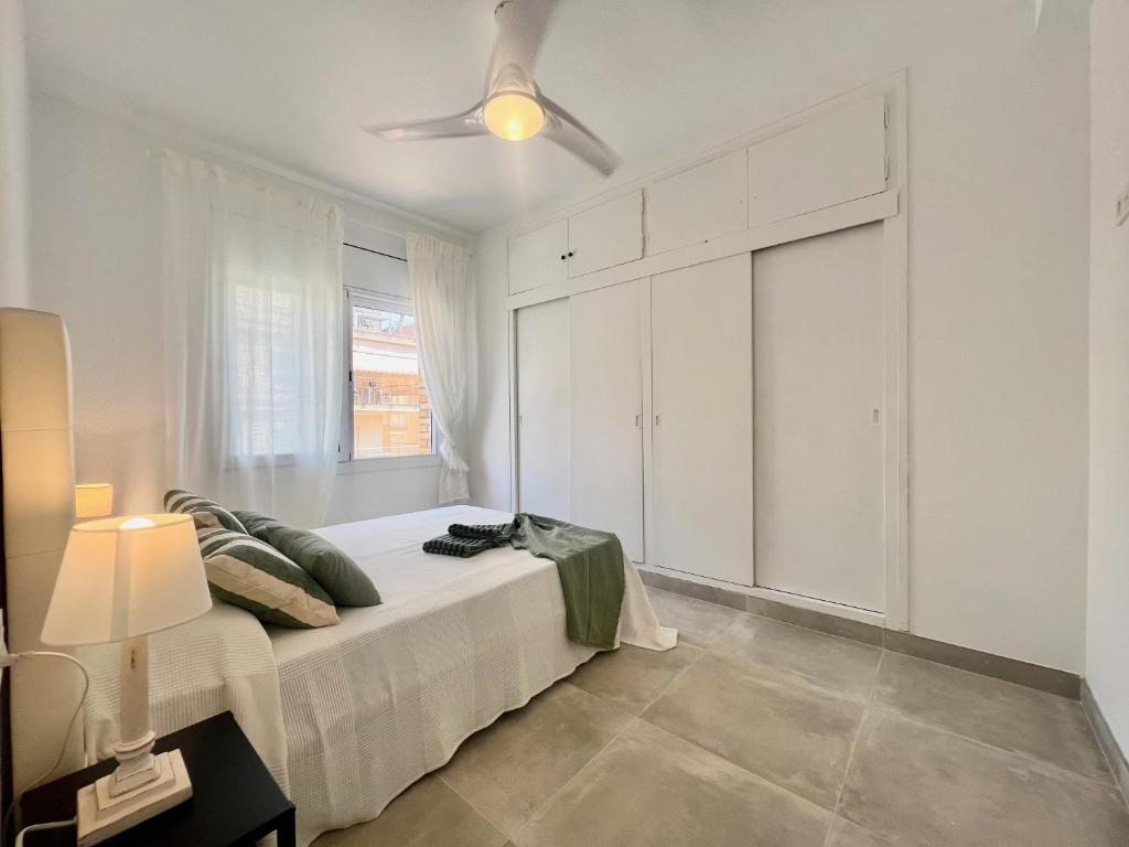 Postel nebo postele na pokoji v ubytování Golden Coast Calafell