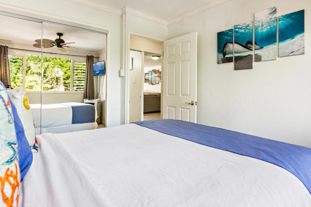 Postel nebo postele na pokoji v ubytování Maui Sands 2F