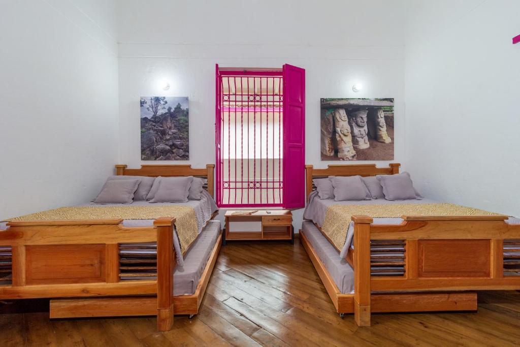Postel nebo postele na pokoji v ubytování Casa Etnika
