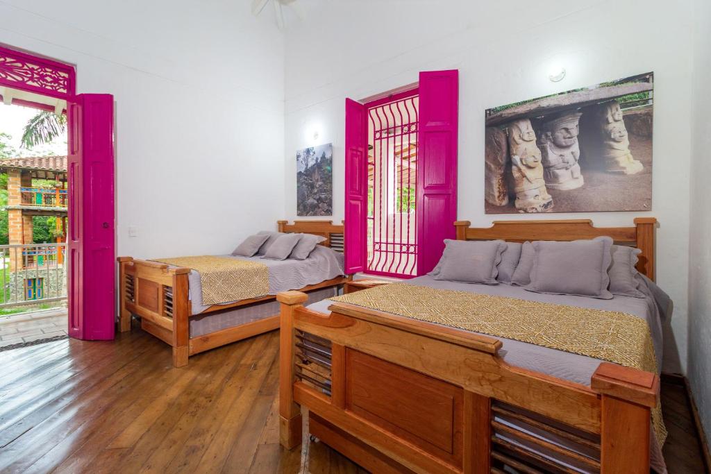 Postel nebo postele na pokoji v ubytování Casa Etnika