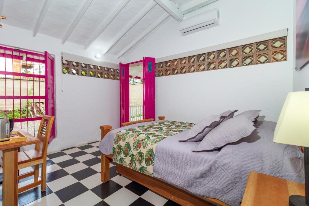 Postel nebo postele na pokoji v ubytování Casa Etnika