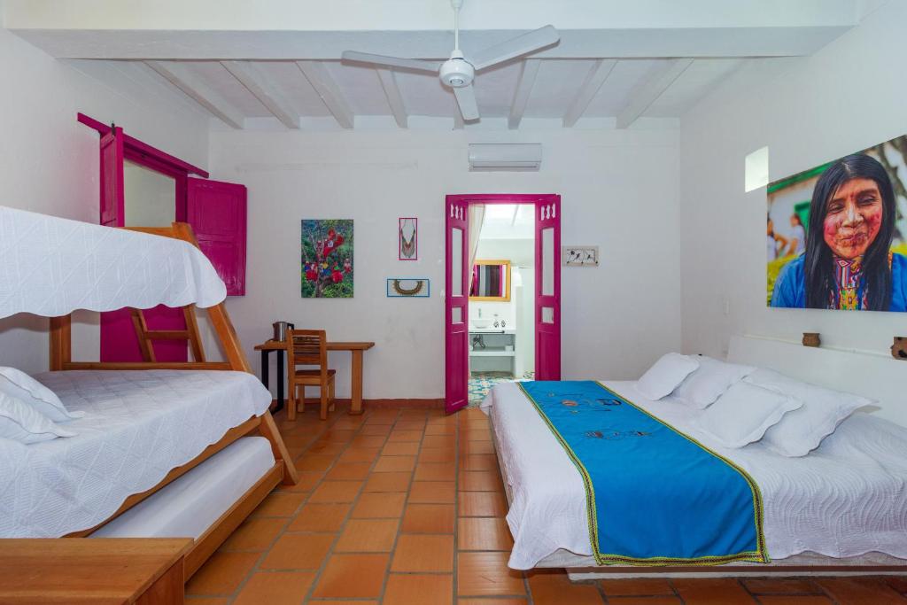 Postel nebo postele na pokoji v ubytování Casa Etnika