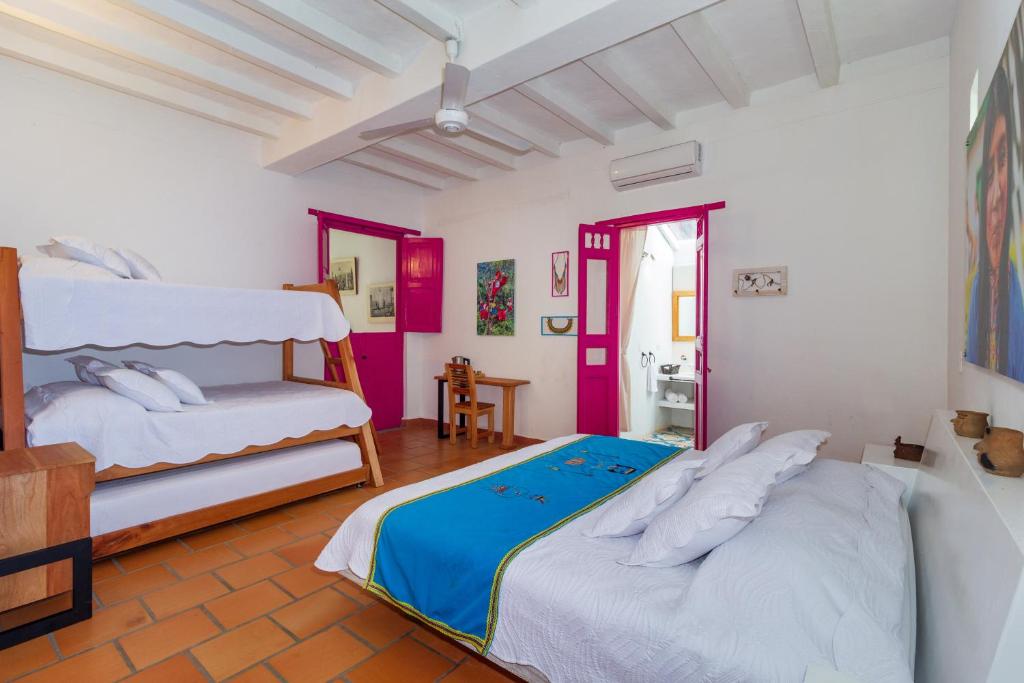 Postel nebo postele na pokoji v ubytování Casa Etnika