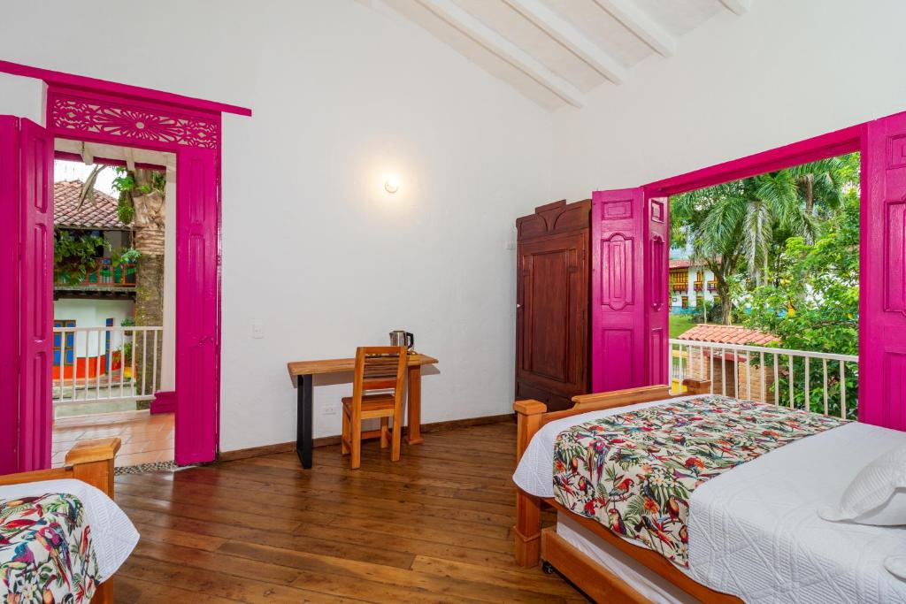 Postel nebo postele na pokoji v ubytování Casa Etnika