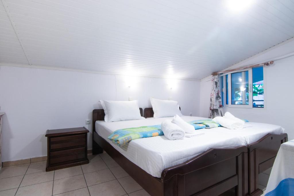 Posteľ alebo postele v izbe v ubytovaní Apartment Liolios #7