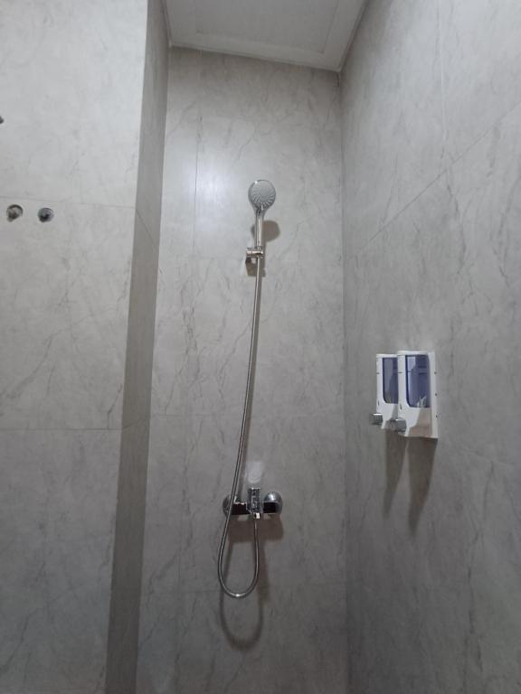 Koupelna v ubytování Grownicle Living Syariah