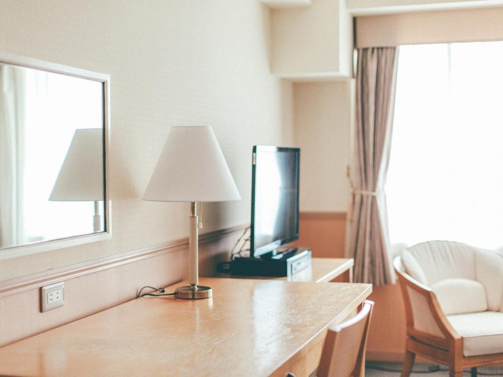 TV a/nebo společenská místnost v ubytování Kanazawa Kokusai Hotel