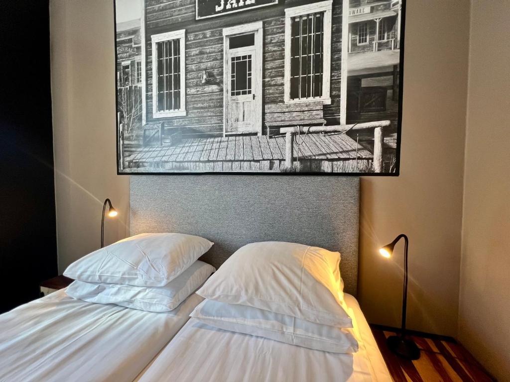 Postel nebo postele na pokoji v ubytování Hotell Siesta