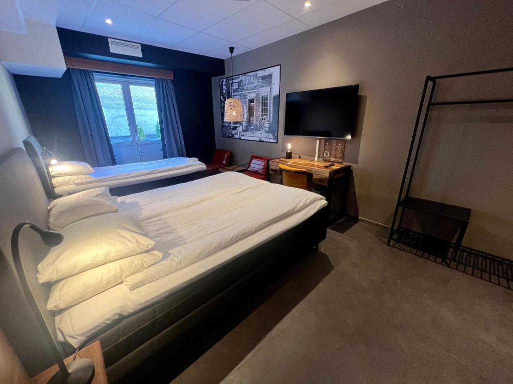 Postel nebo postele na pokoji v ubytování Hotell Siesta
