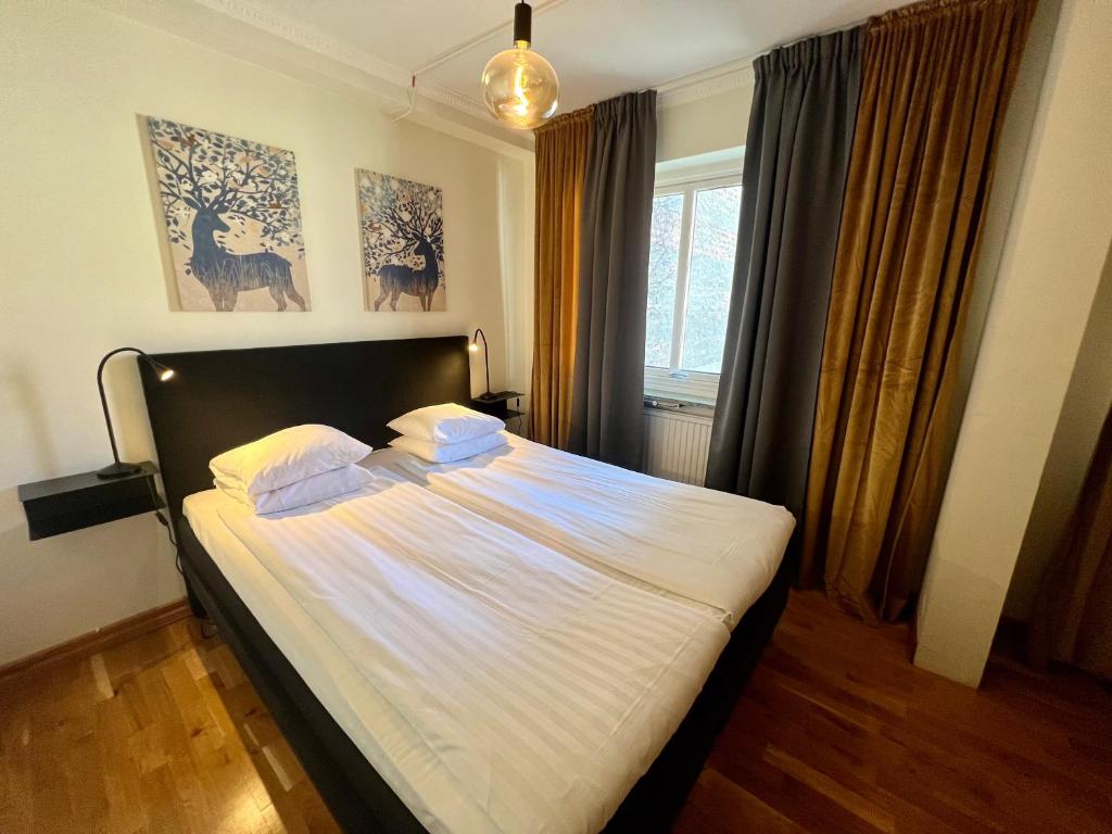 Postel nebo postele na pokoji v ubytování Hotell Siesta