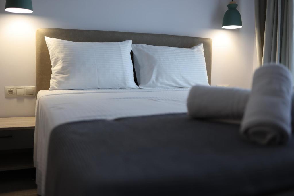 Postel nebo postele na pokoji v ubytování Nautico Rooms