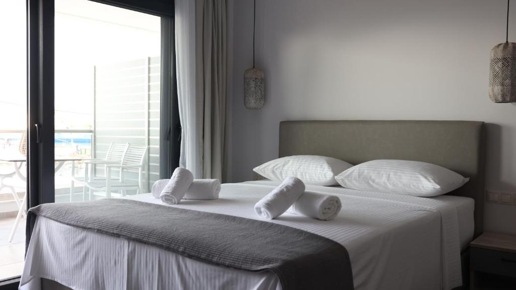 Postel nebo postele na pokoji v ubytování Nautico Rooms