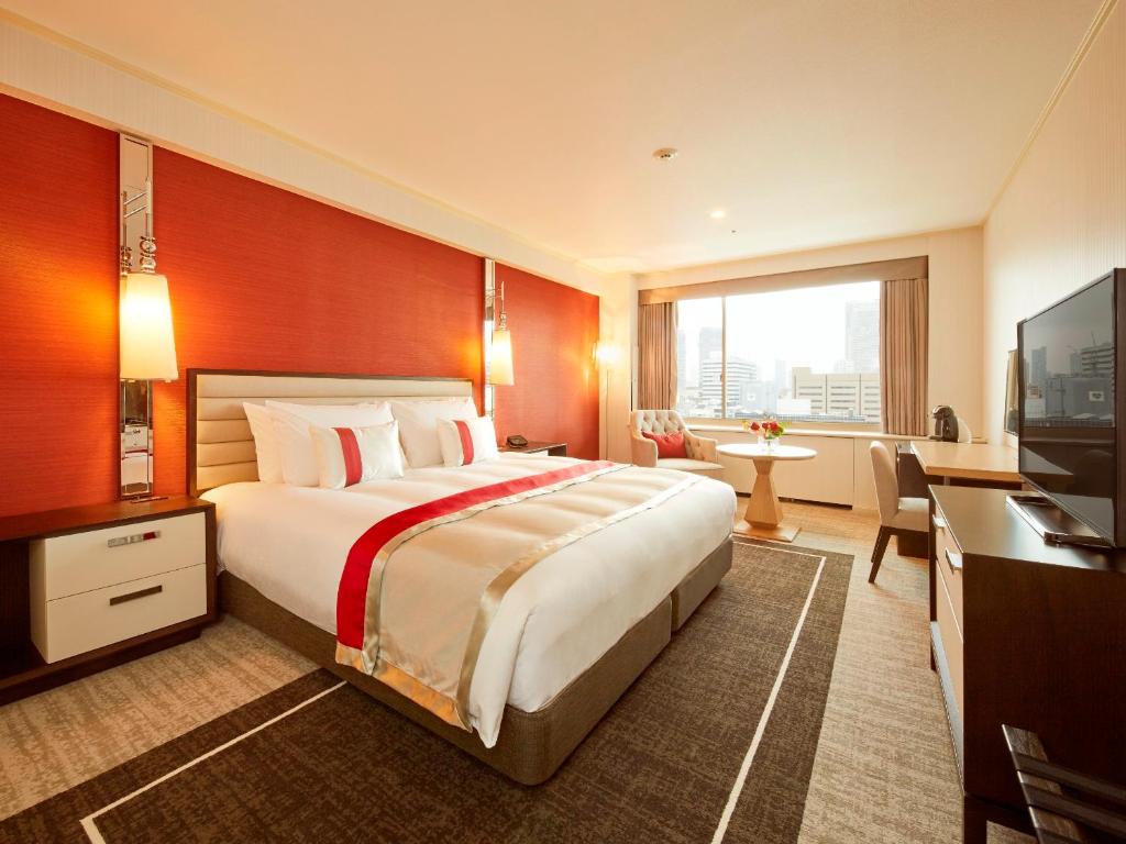 Postel nebo postele na pokoji v ubytování Tokyo Prince Hotel