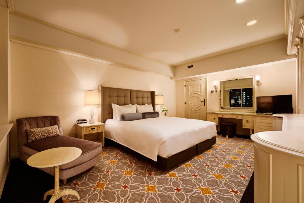 Postel nebo postele na pokoji v ubytování Tokyo Prince Hotel