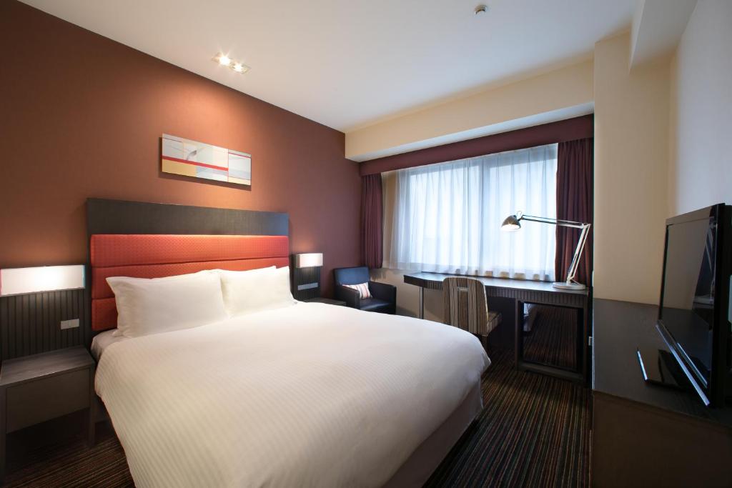 Кровать или кровати в номере Holiday Inn Osaka Namba by IHG