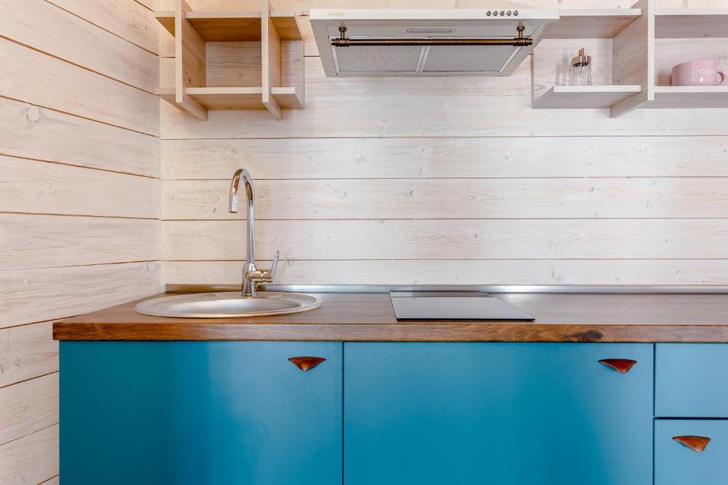 Kuchyň nebo kuchyňský kout v ubytování New Gudauri GoodHost Apartments