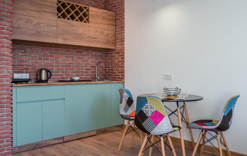 Kuchyň nebo kuchyňský kout v ubytování New Gudauri GoodHost Apartments