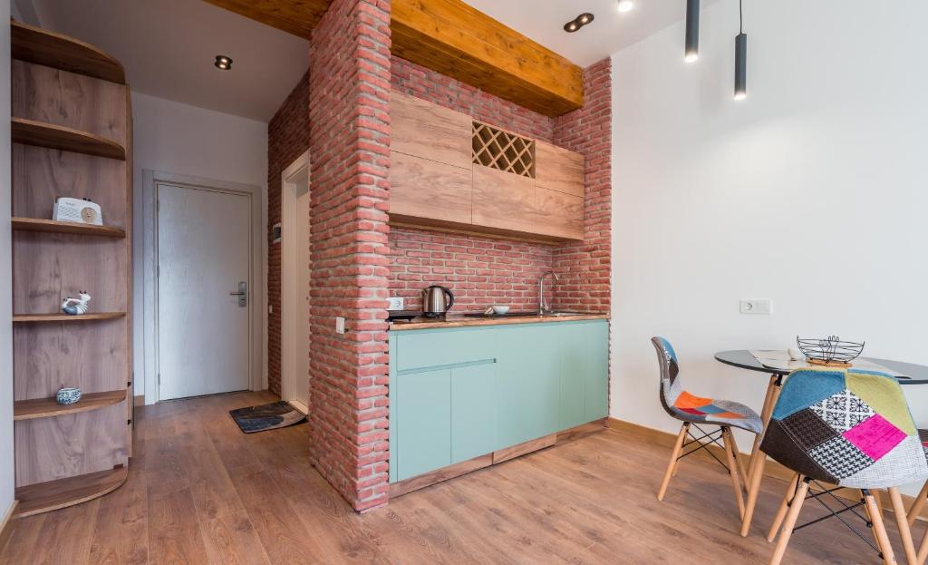 Kuchyň nebo kuchyňský kout v ubytování New Gudauri GoodHost Apartments