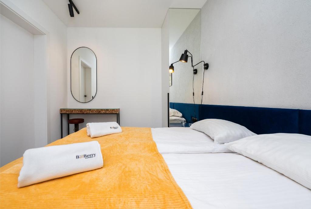 Posteľ alebo postele v izbe v ubytovaní Monte BillBerry Apartments