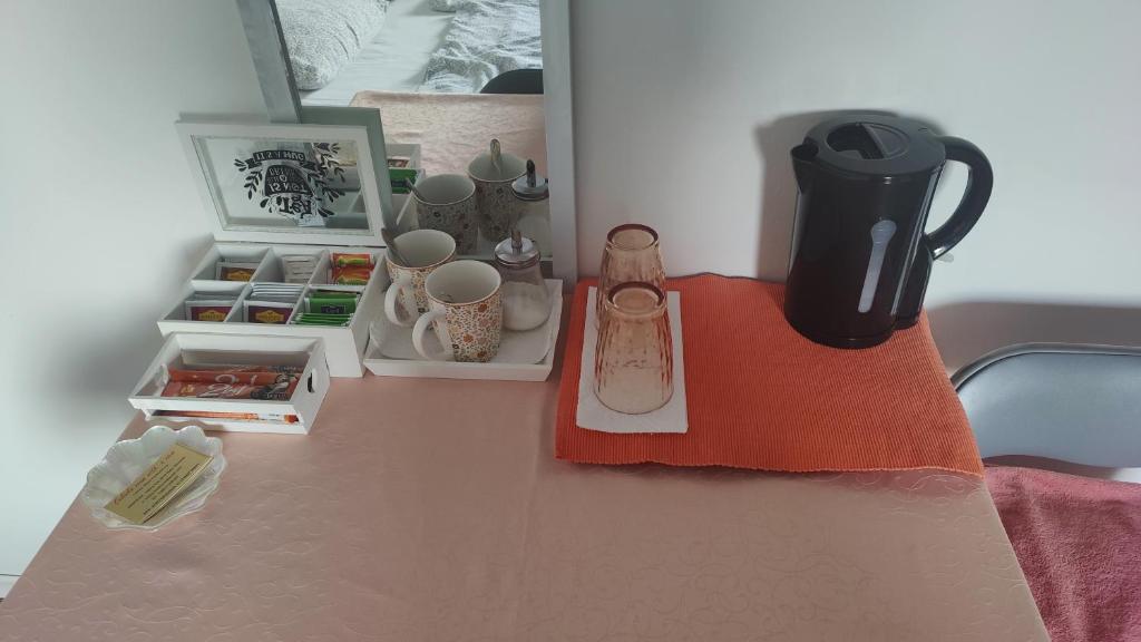 Příslušenství pro přípravu čaje a kávy v ubytování CELINKA rooms