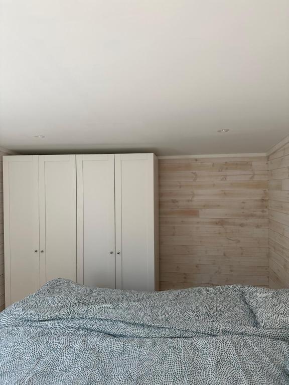 Postel nebo postele na pokoji v ubytování Apartment Ormestad