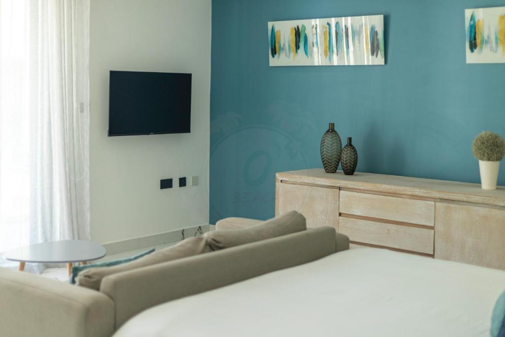 TV a/nebo společenská místnost v ubytování O'Beach Boutique Studios