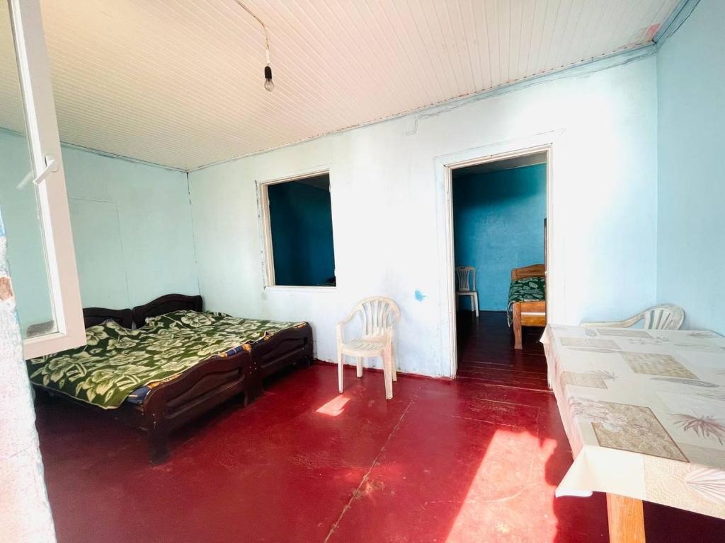 Postel nebo postele na pokoji v ubytování Guesthouse ''Loni''
