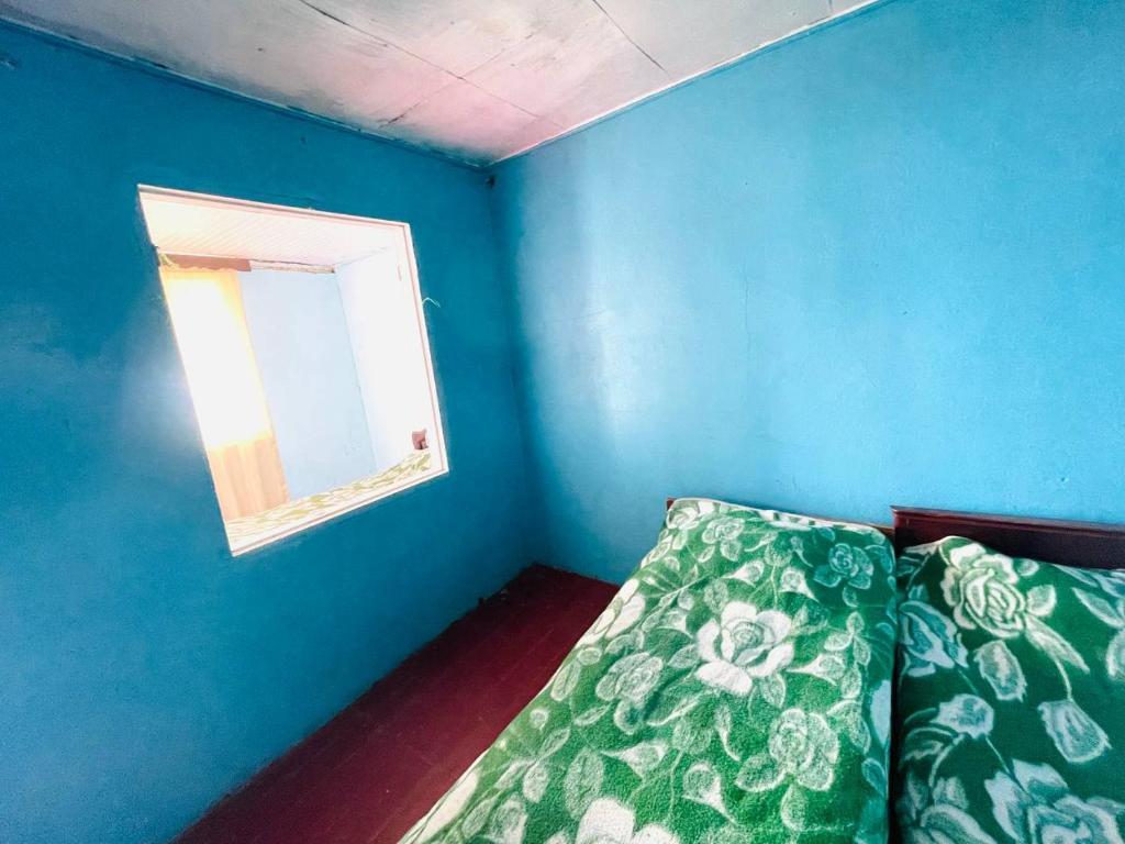 Postel nebo postele na pokoji v ubytování Guesthouse ''Loni''