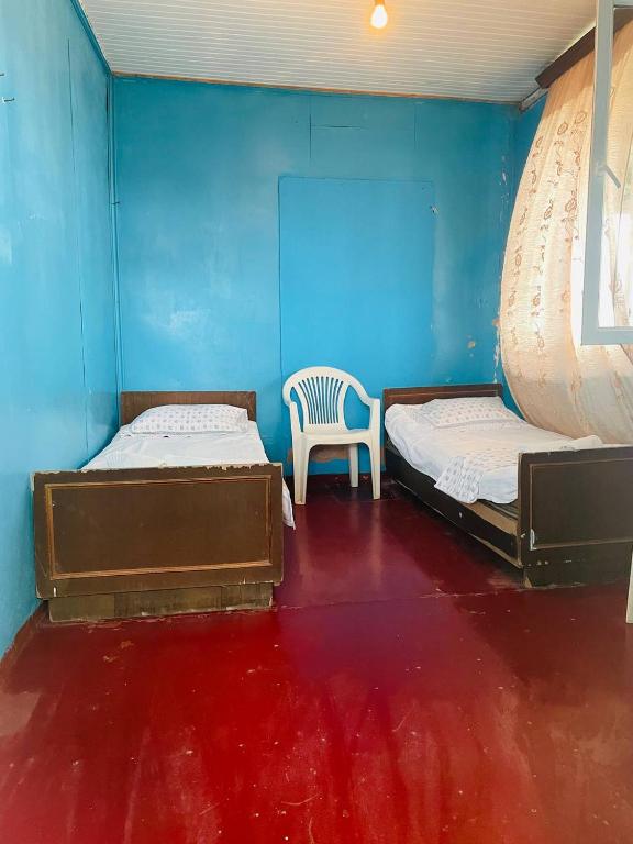 Postel nebo postele na pokoji v ubytování Guesthouse ''Loni''