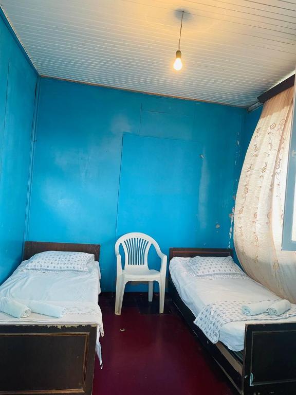Postel nebo postele na pokoji v ubytování Guesthouse ''Loni''