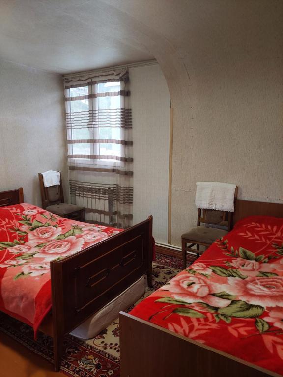 Postel nebo postele na pokoji v ubytování Arman Guest House