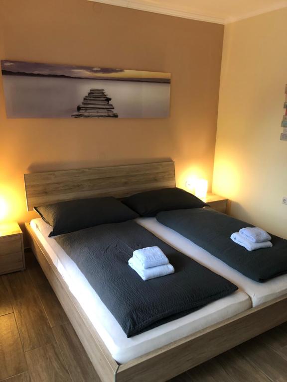 Postel nebo postele na pokoji v ubytování AlpenKlub Hotel