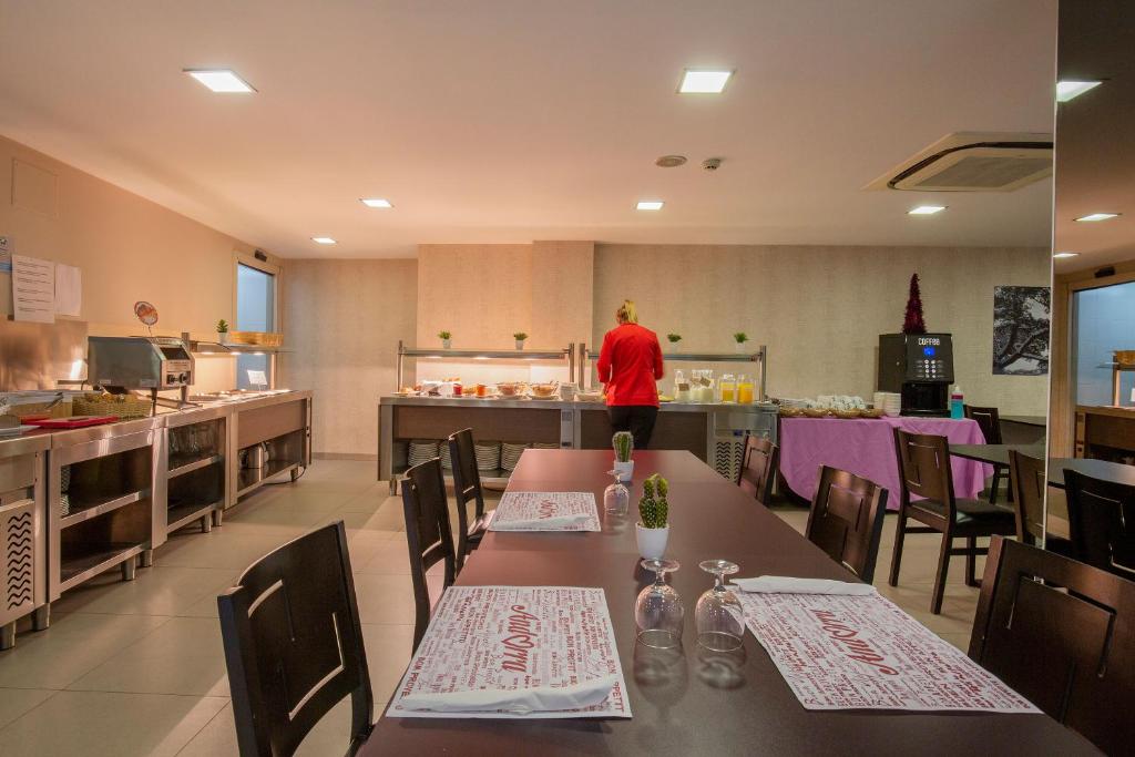 Kuchyň nebo kuchyňský kout v ubytování Hotel Del Pui