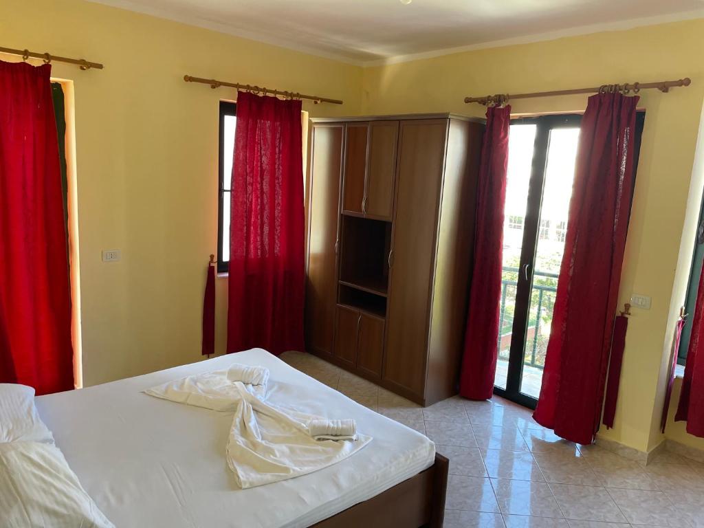 Postel nebo postele na pokoji v ubytování Sanremo Hotel Restorant
