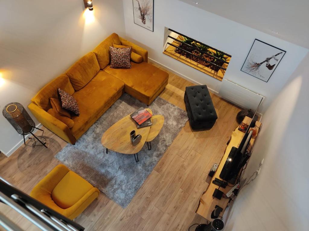 Posezení v ubytování Loft Cosy et atypique