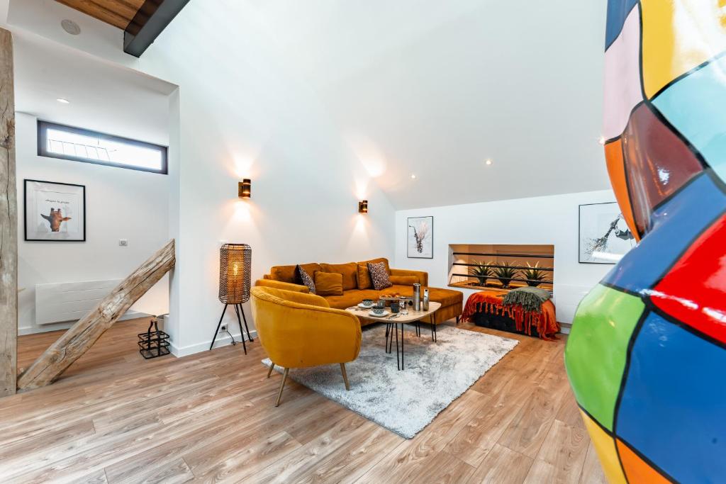 Posezení v ubytování Loft Cosy et atypique