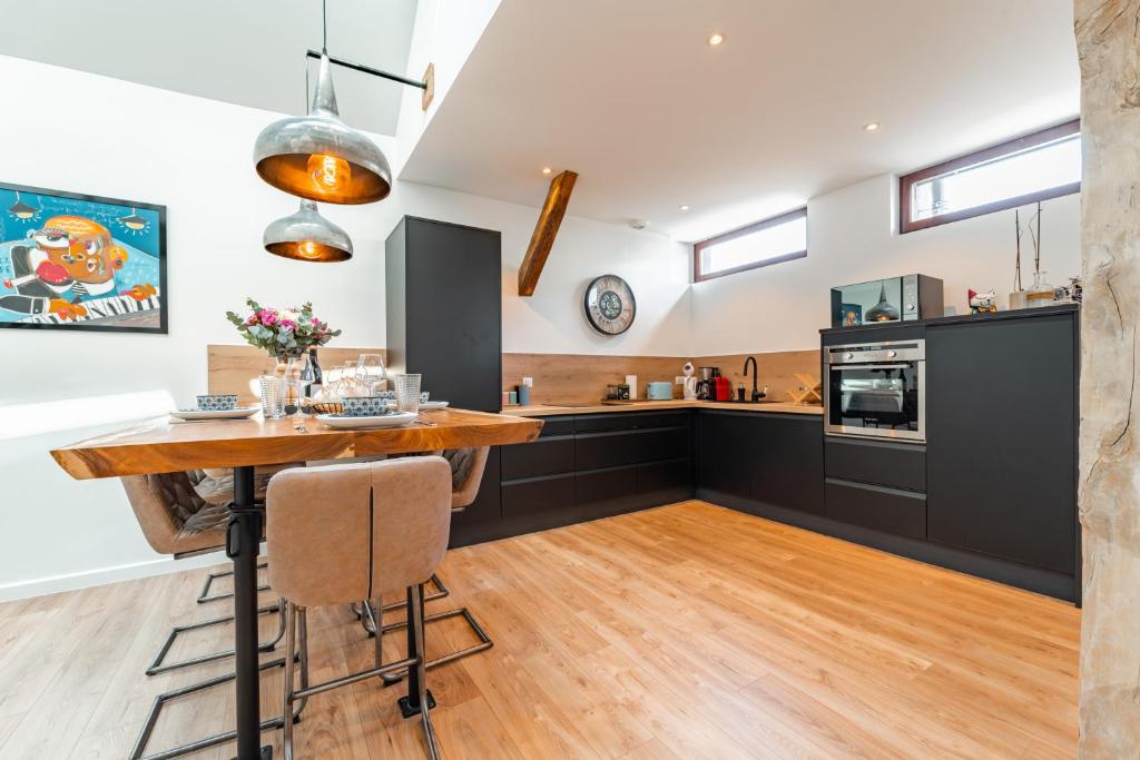 Kuchyň nebo kuchyňský kout v ubytování Loft Cosy et atypique