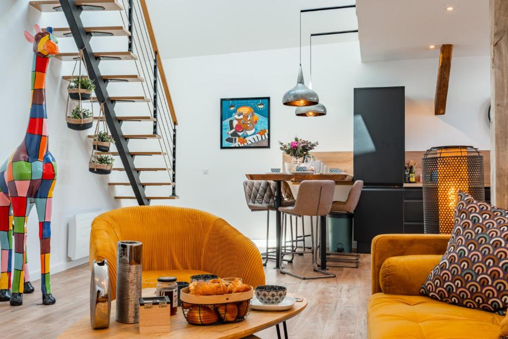 Posezení v ubytování Loft Cosy et atypique