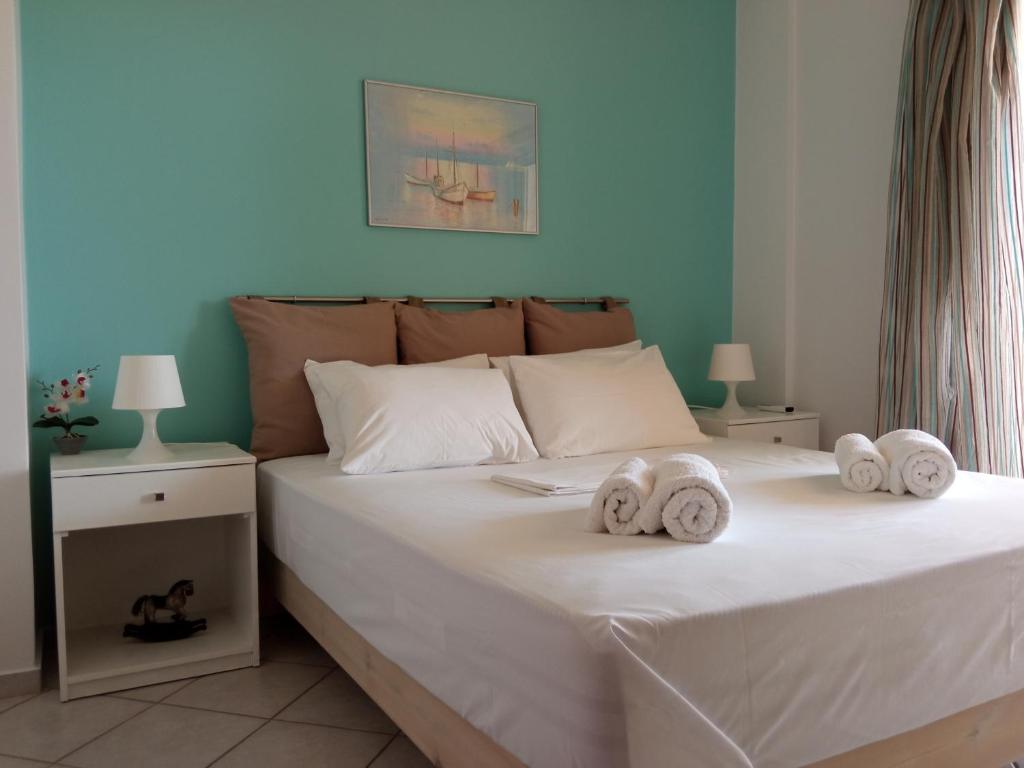 Posteľ alebo postele v izbe v ubytovaní Sea Side House Kourouta