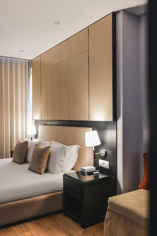 Postel nebo postele na pokoji v ubytování Hotel Oasis