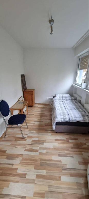 Postel nebo postele na pokoji v ubytování Monteurhaus in Hemer - Gemeinschaftsnutzung Küche und Bad