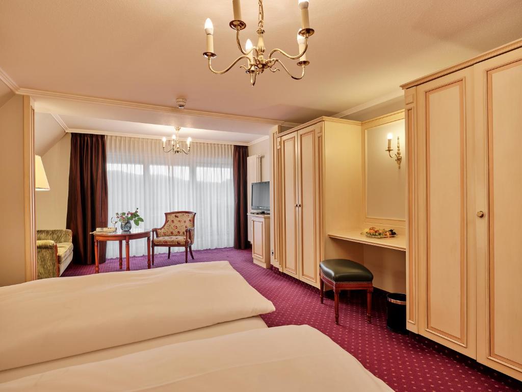 Postel nebo postele na pokoji v ubytování Hotel Reppert