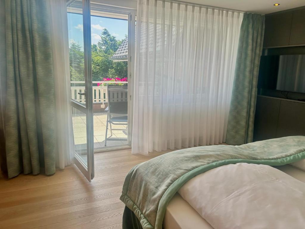 Postel nebo postele na pokoji v ubytování Hotel Reppert