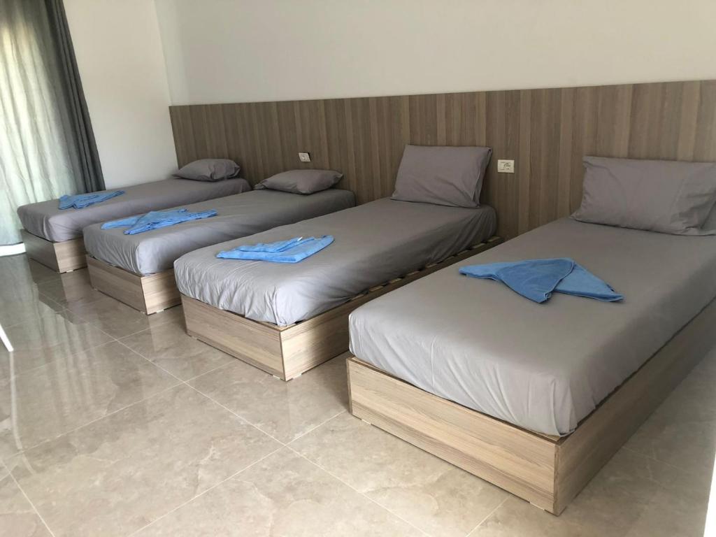 Postel nebo postele na pokoji v ubytování Sweet Hotel