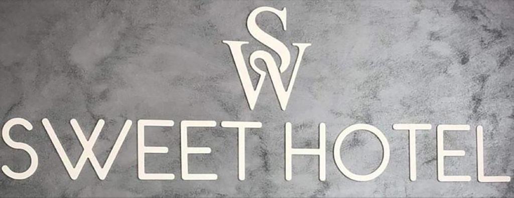 Certifikát, hodnocení, plakát nebo jiný dokument vystavený v ubytování Sweet Hotel
