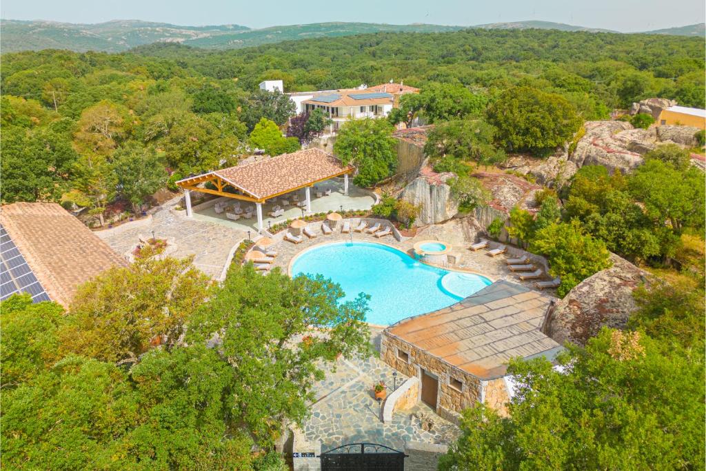 an aerial view of a resort with a swimming pool at Paghe Eco Luxury Experience in Buddusò