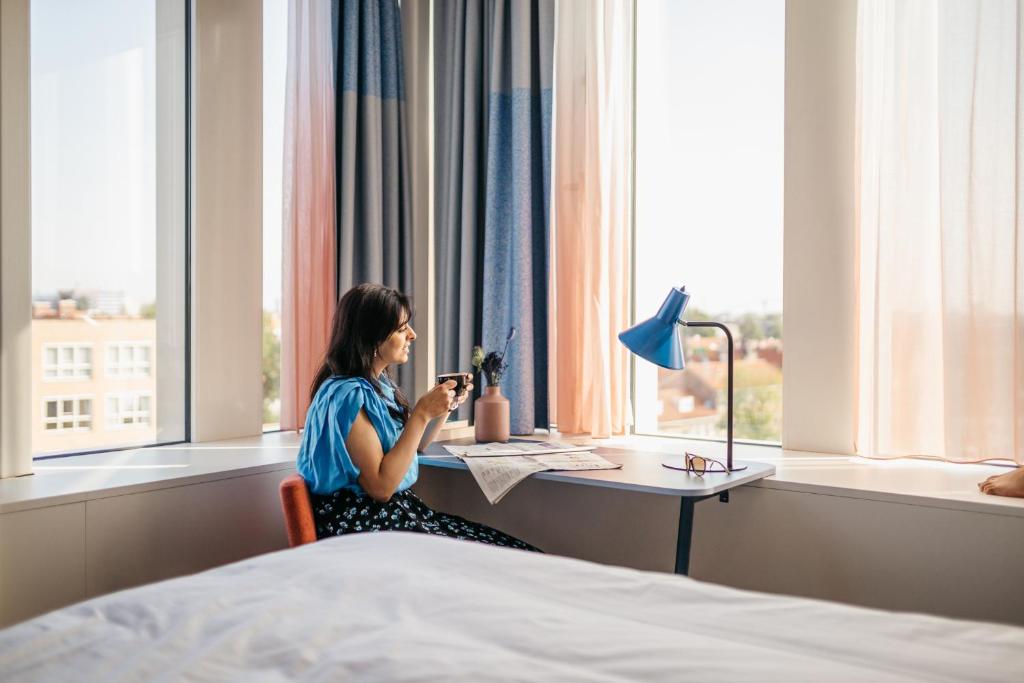 Een bed of bedden in een kamer bij Hotel Casa Amsterdam