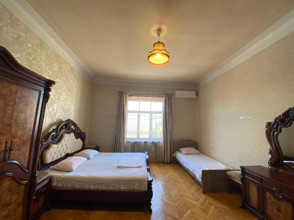 Postel nebo postele na pokoji v ubytování Valiko house in Telavi